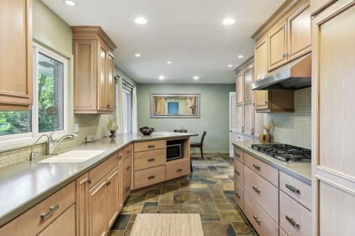 Gourmet kitchen with gas range and plenty of cabinetry!