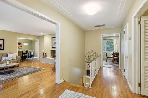View of the open floorplan and gorgeous hardwood floors from the front door