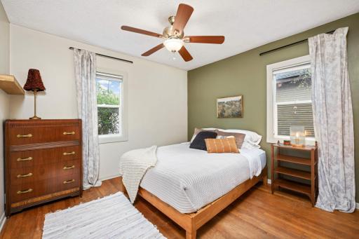 Bedroom number 1 features 2 windows, a perfectly sized closet and fabulous wood floors!