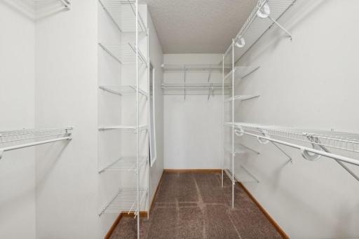 Large primary walk-in closet!! Look at all that space!