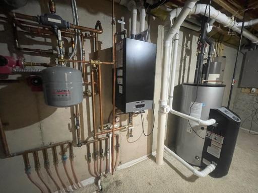 New Gas Boiler 2022. In-floor heat in basement and garage.