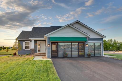 Welcome home to the Bryant II Northern Craftsman at Ravine Crossing in Cottage Grove! Photo is of Model home. Options and colors may vary. Ask Sales Agent for details.