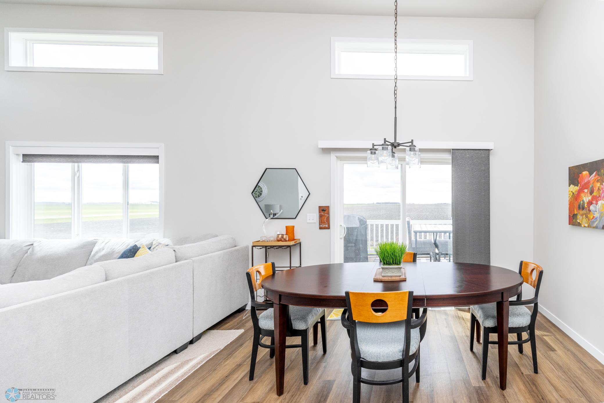 Extra leaf in this table so the dining area is great for entertaining