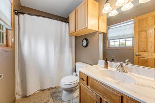 Primary bathroom suite designed for both convenience and privacy.