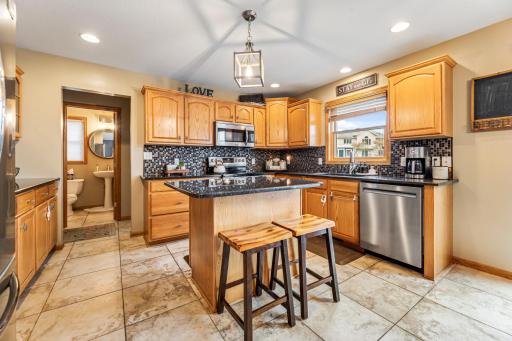 Stunning kitchen featuring stainless steel appliances and exquisite cabinetry.