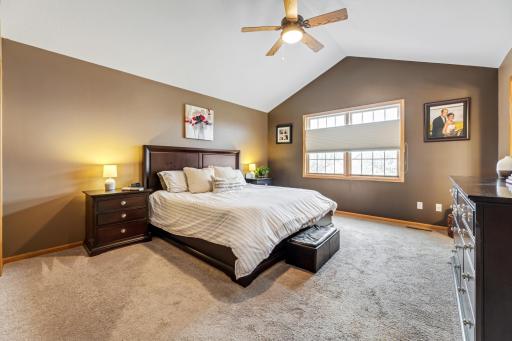 Master bedroom suite with soaring ceilings.