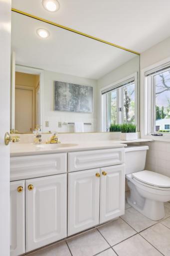One of five baths in your home, white and bright!