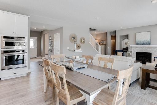 One of two dining spaces on the main level, this informal space is still large enough to accommodate just about any dining room table configuration! (Photo of model, colors may vary)