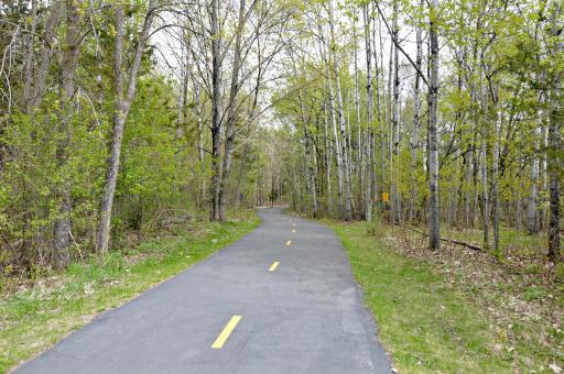 Home to 4,900 acres of recreational bliss and walking distance from your new home, Elm Creek Park is an outdoor haven and features activities for all seasons - including biking, running, swimming, playing, skiing, tubing, a nature center and more!!