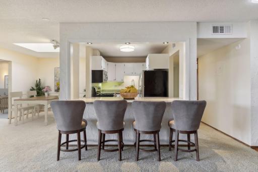 Kitchen and island are open to the living area providing a floor plan to works with today's style of living. Virtually Staged