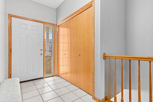As you step into the home, the tile floors lead you past the coat closet to the inviting living room. The staircase is located in the front of the home allowing a generous main floor living and large lower level family room.