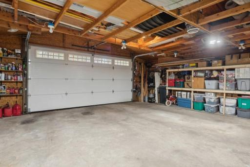 25x23 heated insulated garage with steel siding/roof, 200amp service and adjacent recreation/TV room