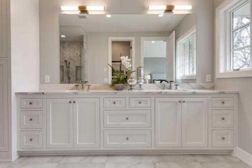 Double vanity sink with generous counter space and storage.