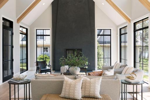 Incredible vaulted living room with wood-beamed ceilings.