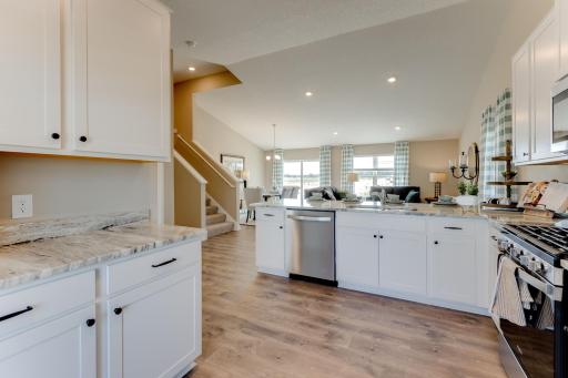 All of that beauty, and still plenty of room for the home's chef to maneuver about the space as they prepare that next great meal! Photo is of model - colors may vary.