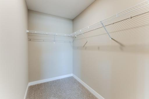 Lower-level bedroom large walk-in closet. Photo is of model - colors may vary.