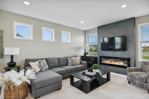 Tons of natural light in this open concept floorplan! *Photos of model home; colors and finishes will vary.