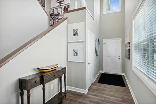 A welcoming entrance to the spacious, two-story foyer! *Photos of model home; colors and finishes will vary.