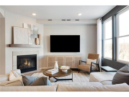 Cozy up on those cold Minnesota night to your gas fireplace! (Option varies home to home). Photo of model home.