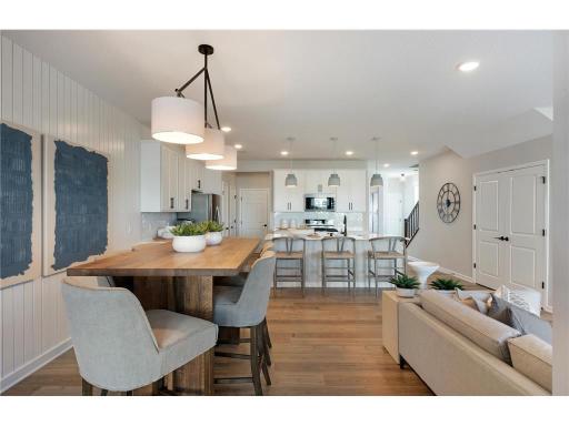 Conveniently located off the kitchen we find the dining room! Perfectly sized to accommodate any table or set up you could want! Photo of model home.