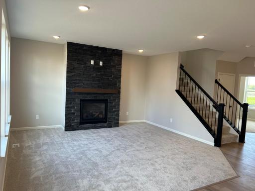 Gorgeous floor to ceiling stone gas fireplace