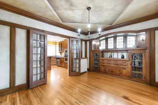 Formal Dining Room features hardwood floors...built in buffet..and french doors that lead to the Kitchen