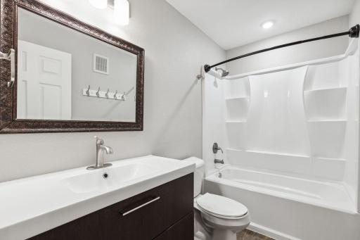 Third full bathroom is located in the lower level