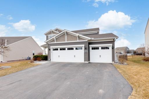 Experience ample storage and convenience with thee three-car garage, offering versatility and space for vehicles, tools, and hobbies!!