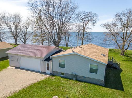 A street side view of the home and garage with mighty MilleLacs to the west...