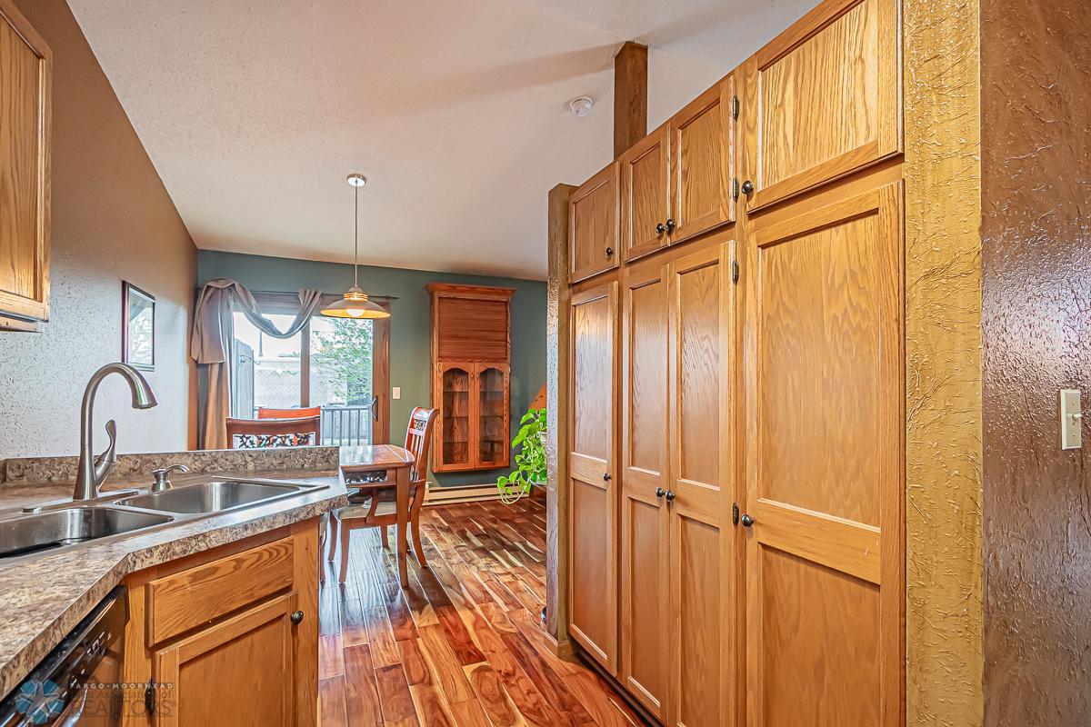 Great pantry space! Newer SS Appliances, laminate flooring, countertop & backsplash.
