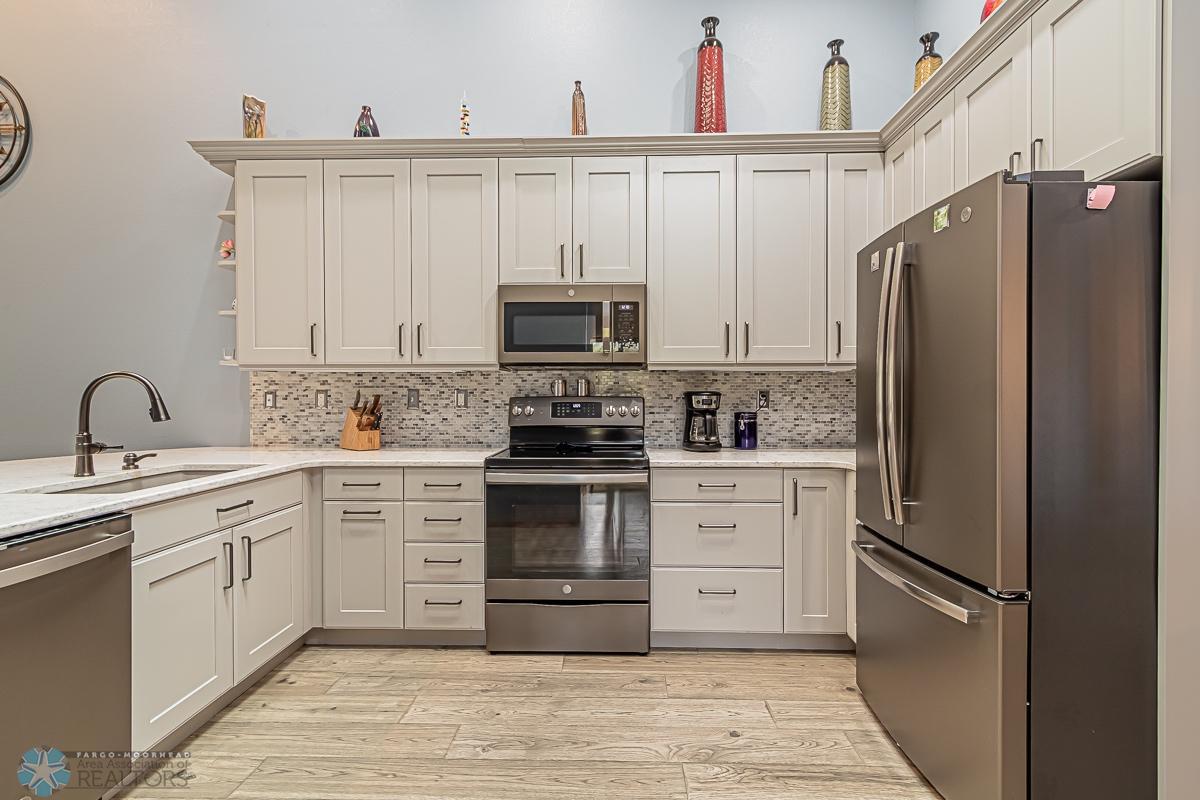Beautiful updated Kitchen with Quartz counters and SS appliances