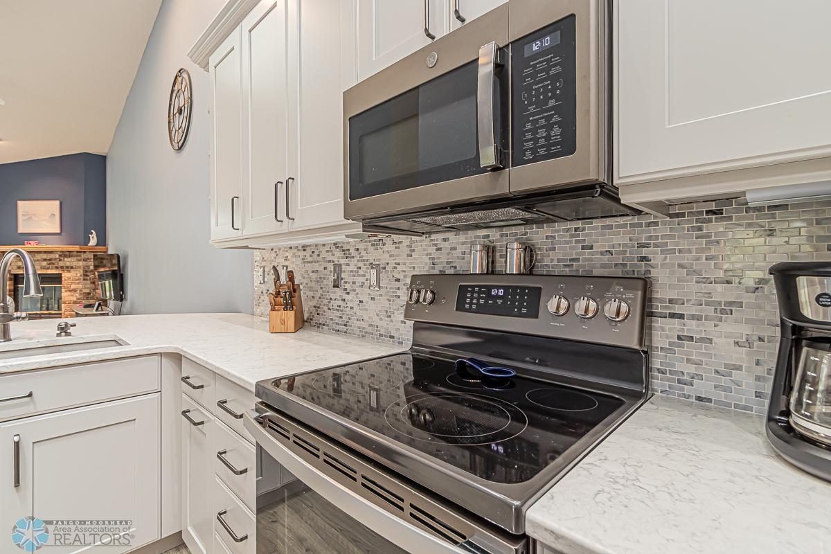 Beautiful tile backsplash in Kitchen