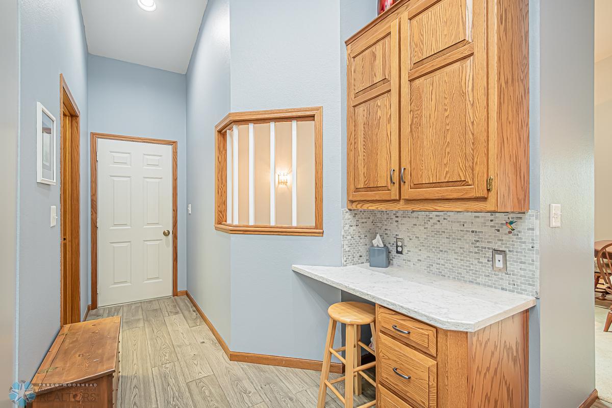 Built in desk and cabinets in kitchen