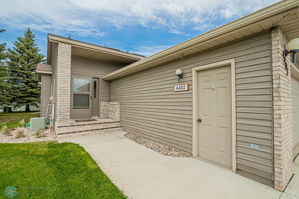Front entry and door to garage