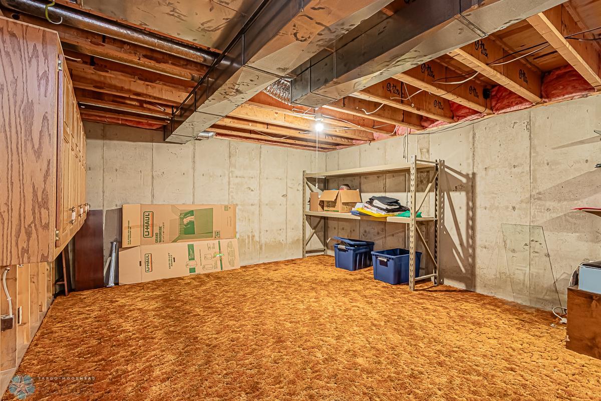 Lower Level Storage room - Location for future bedroom would need to add egress window