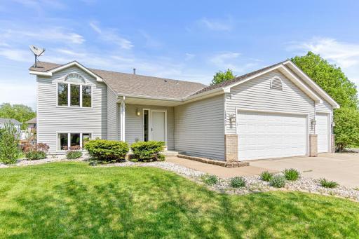 Welcome to 18896 Embers Avenue in Farmington. This fantastic home is situated on a large corner lot and is fully fenced in. The curb appeal will grab your attention with beautiful low maintenance shrubs and perennials surrounding the home.