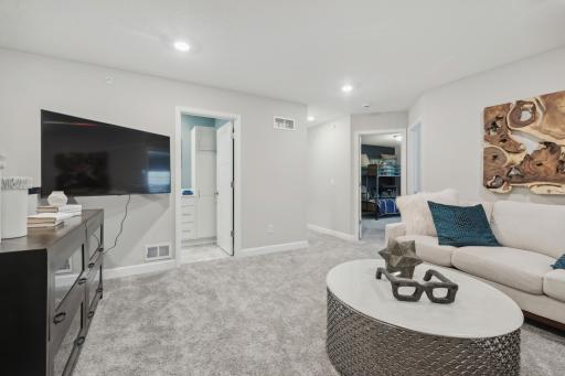 (Photo of a decorated model, actual homes finishes will vary) The upper-level loft offers an additional seating area for watching TV, gaming, homework, etc.