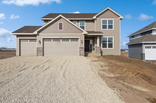 Actual picture of the home. Welcome home! Introducing our Lewis plan! Home has LP Smart siding on the front, a walkout unfinished basement & is in a cul-de-sac on a .38 acre homesite. Includes sod, irrigation & a landscape package.