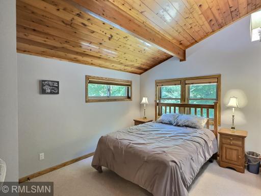 The second bedroom in the upper level is 1 of 6, imagine all your weekend summer guests you can invite!