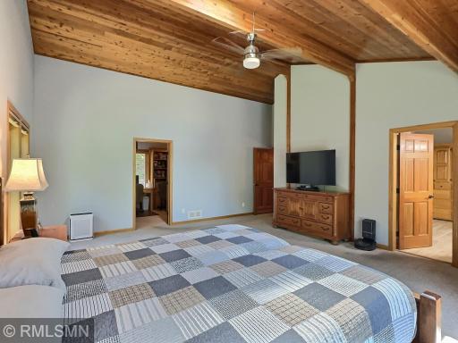 Enjoy space for all your furniture in the primary bedroom. The office is to the left, bathroom is on the right.