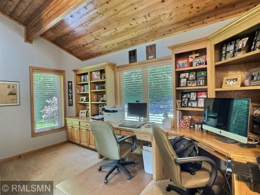 Tucked away in the primary bedroom, the office is complete with a built-in desk with tons of storage space.
