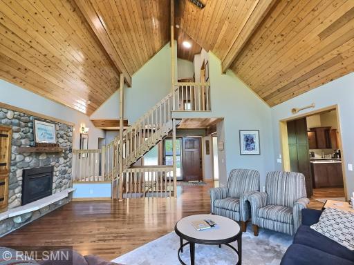 The terrific open staircase leads to the upper lever offering amazing views, 2 bedrooms and a 3-quarter bath.