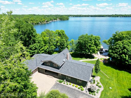 Stunning Lindal Cedar built home set on over an acre and a half of level land and 154 feet of gorgeous Lake Sylvia shoreline.