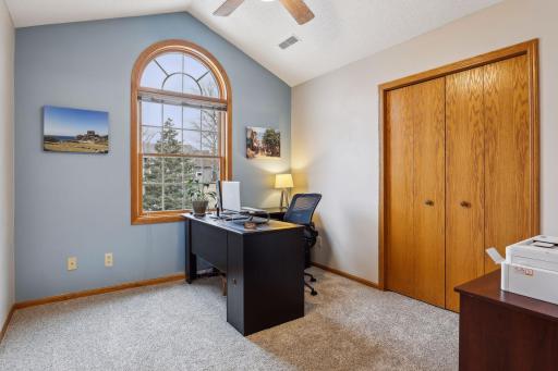 The third bedroom can be used as an office or hobby room, lots of options. The vaulted ceiling on this room and picturesque window gives this room a spacious feeling.