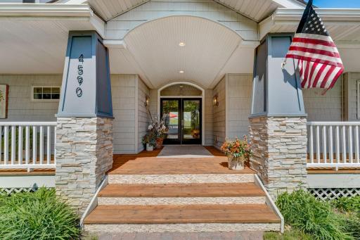 Stately Entrance with Beautiful Curb Appeal and Freshly Stained Cedar Decking