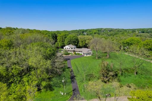 Private Drive into your peaceful multi-generational family home