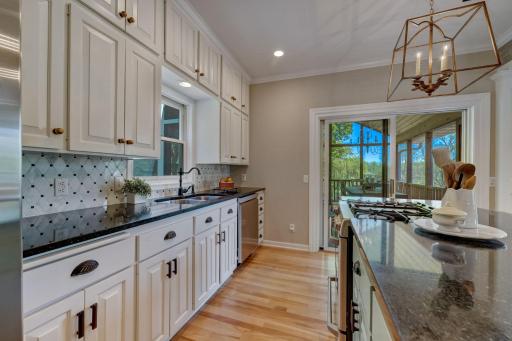Granite Counters, Gas Range, New Faucet, Cabinetry to the Ceiling Custom Kitchen