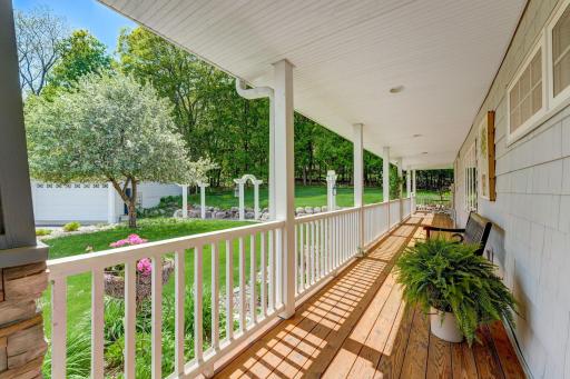 Tranquil Expansive Front Porch overlooking beautiful landscape to greet guests