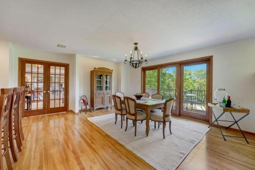 Secondary dining room with beautiful backyard views.