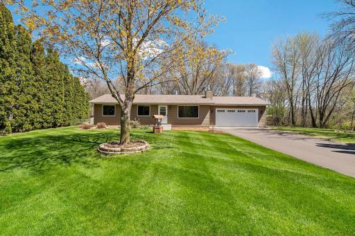 Nestled in the charming community of Circle Pines, MN, this stunning one-story 4-bedroom home awaits its new owners on close to an acre lot. This home offers the perfect blend of small-town charm and urban convenience.